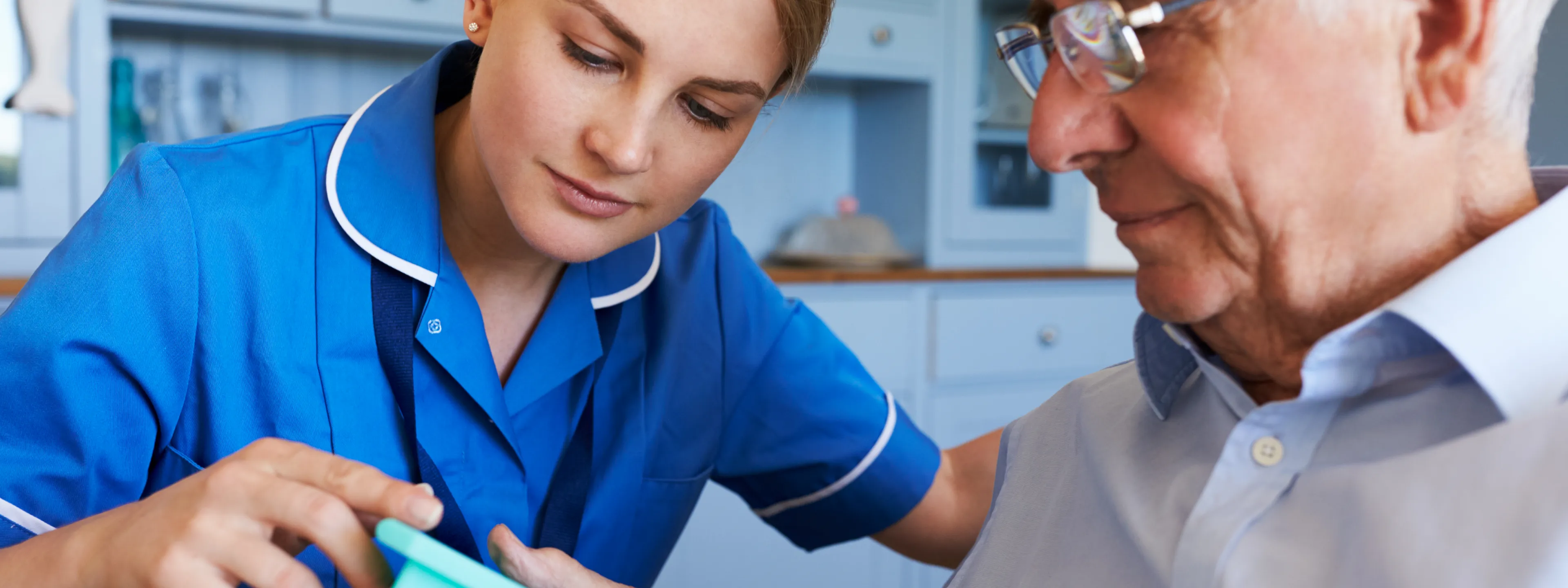 Image of a nurse consulting talking about medications with a patient