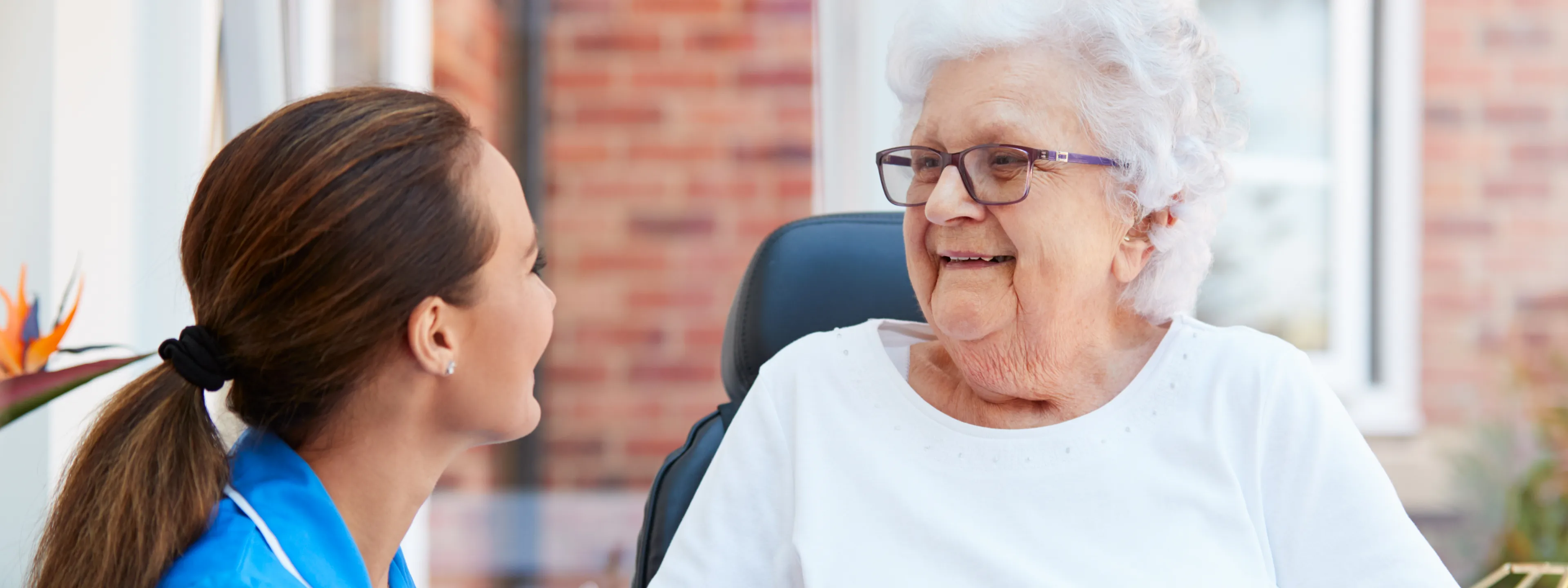 Image of a nurse talking with a client